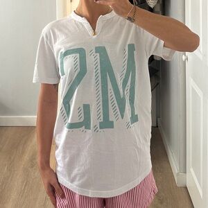 White T-Shirt with Teal Graphic